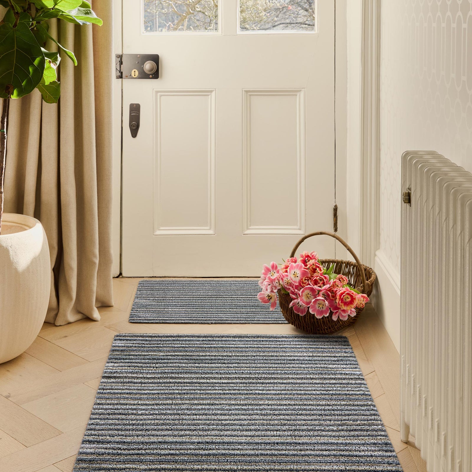 Candy Portland Stripe Washable Doormat made from 100% recycled materials, featuring a subtle striped pattern.
