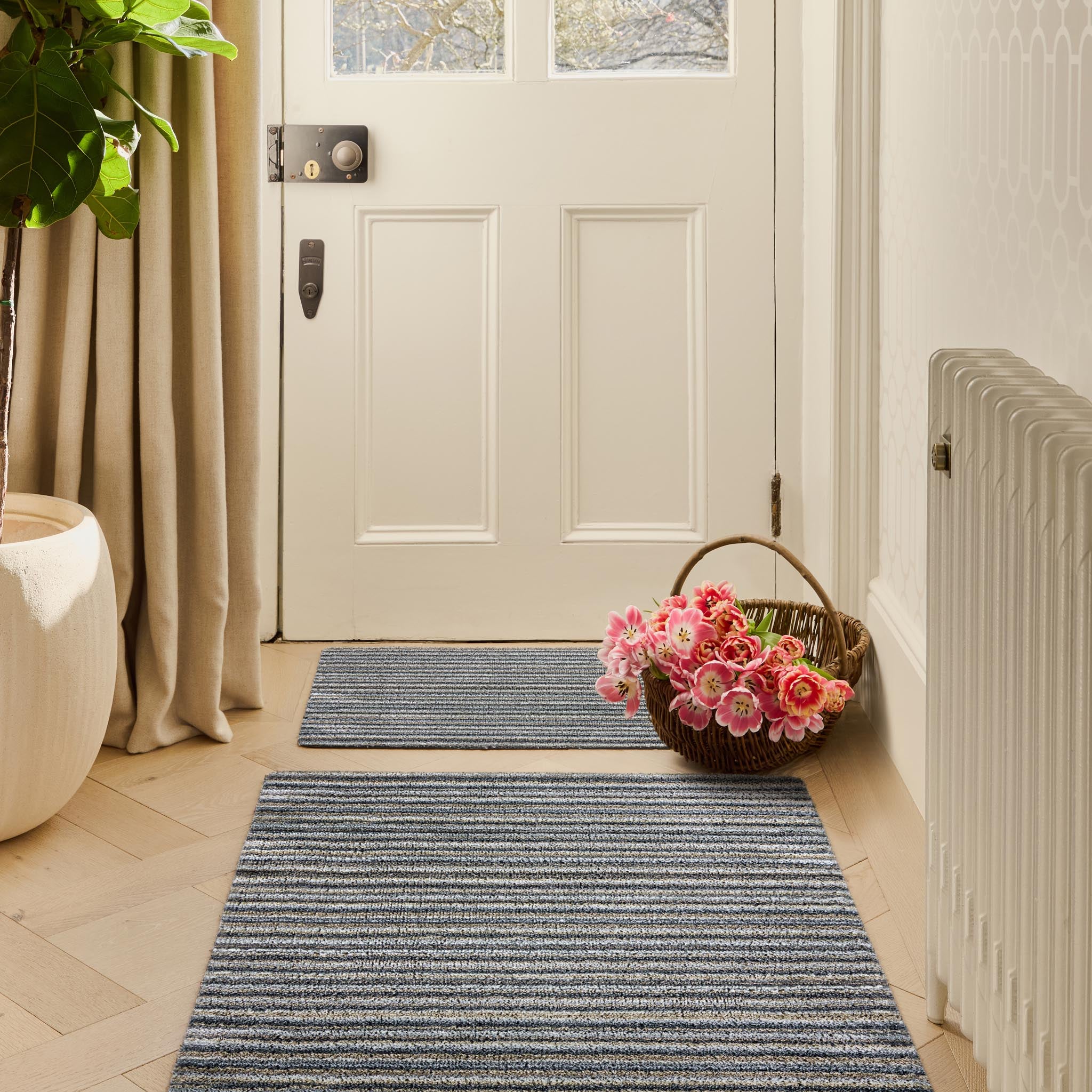 Candy Portland Stripe Washable Doormat made from 100% recycled materials, featuring a subtle striped pattern.