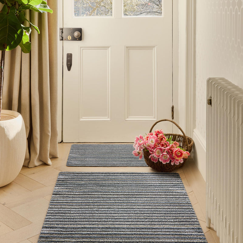 Candy Portland Stripe Washable Doormat made from 100% recycled materials, featuring a subtle striped pattern.