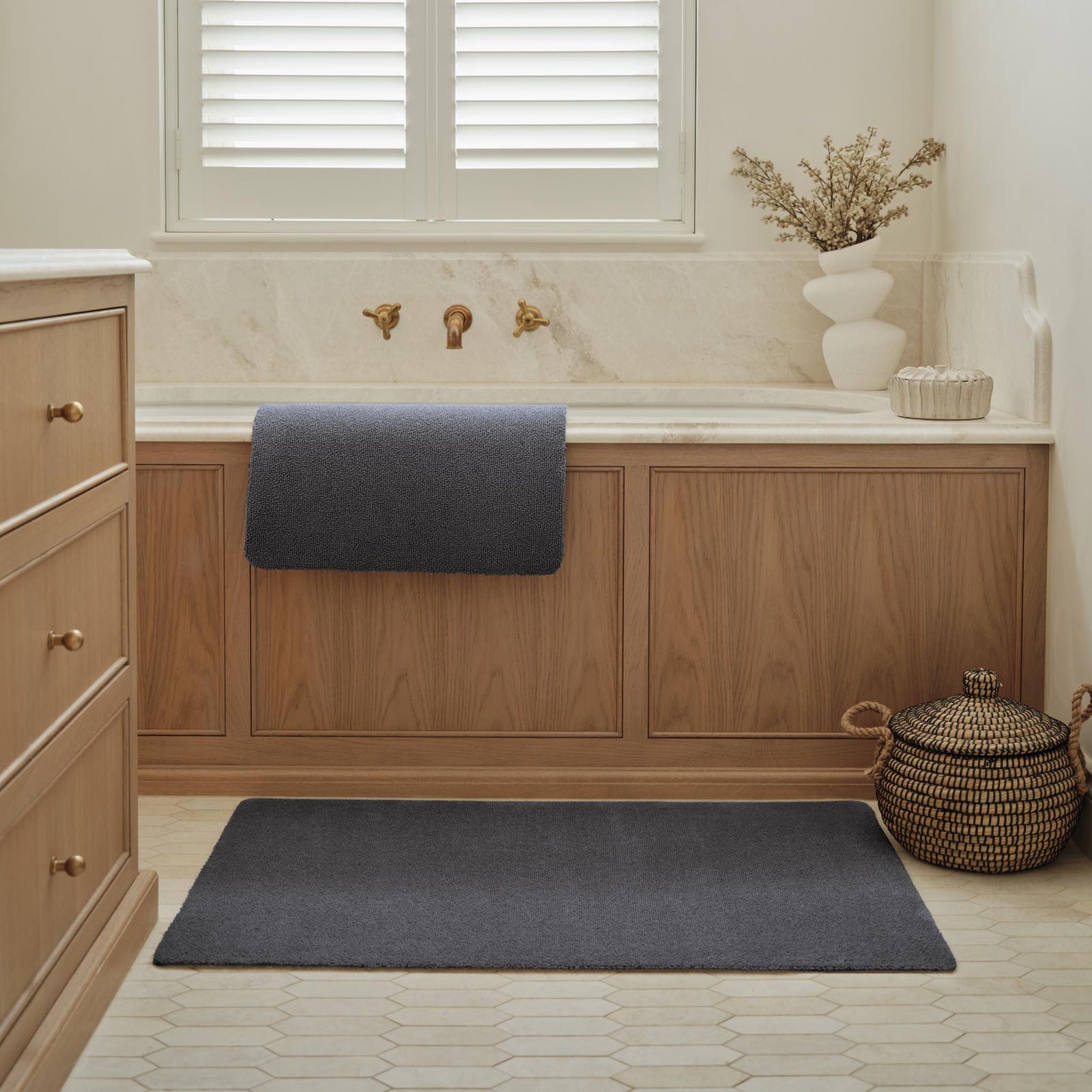 Sense Charcoal Bath Mat made from 100% recycled content, fully machine washable.