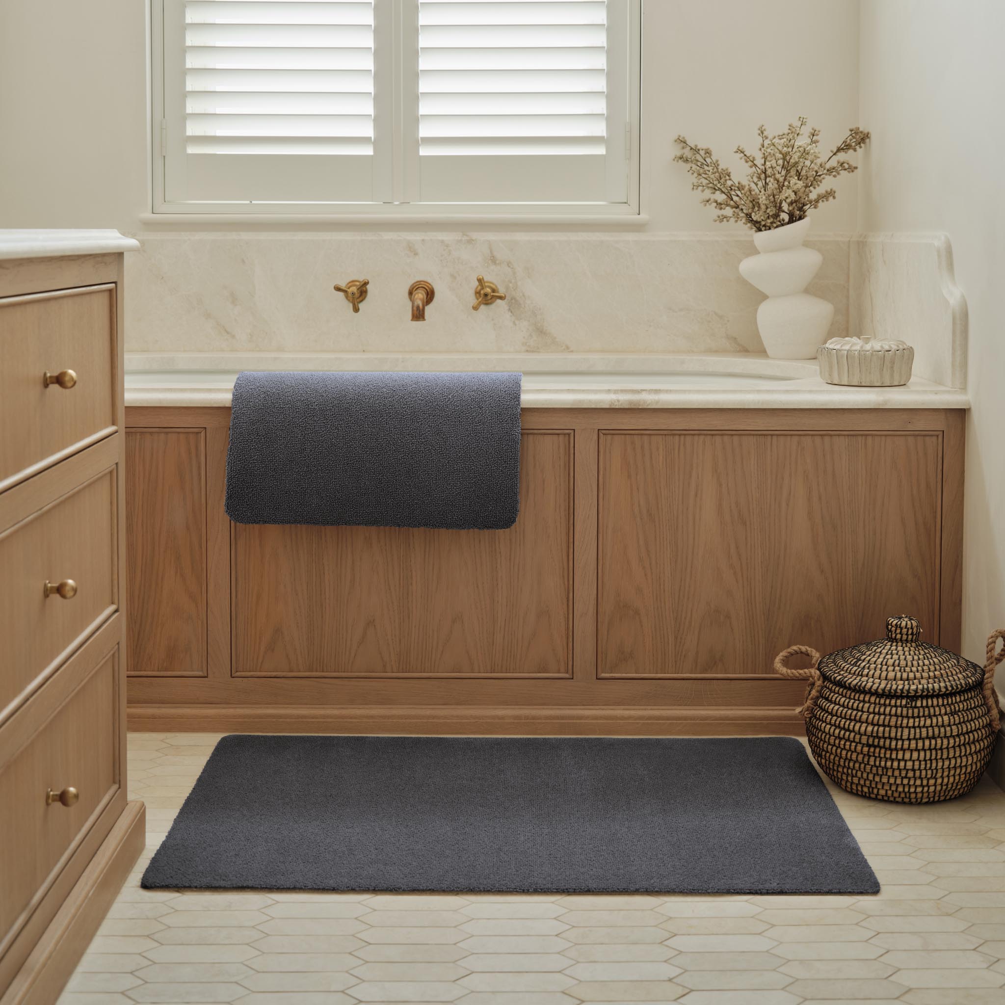 Sense Charcoal Bath Mat made from 100% recycled content, fully machine washable.