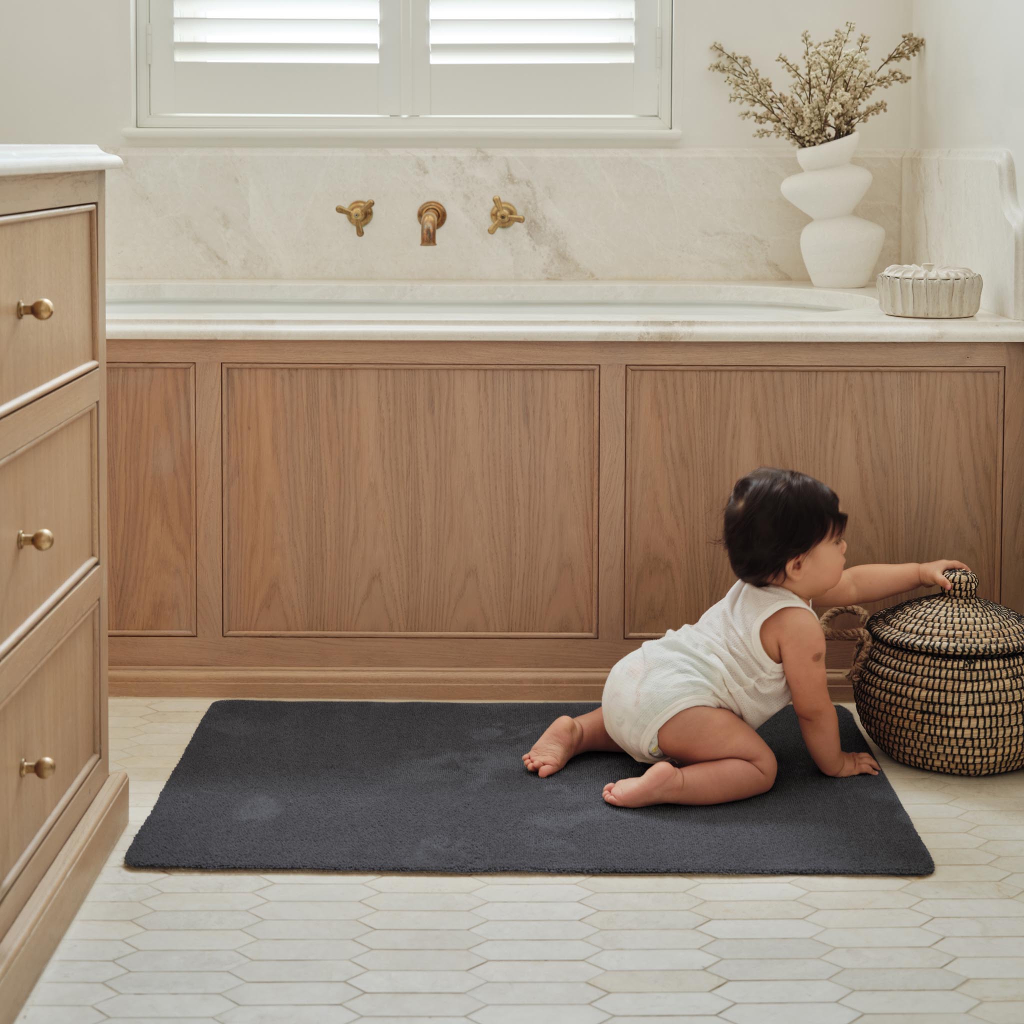 Sense Charcoal Bath Mat made from 100% recycled content, fully machine washable.