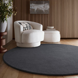 Sense Charcoal Washable Rug- a 100% recycled polyester rug in a dark grey.
