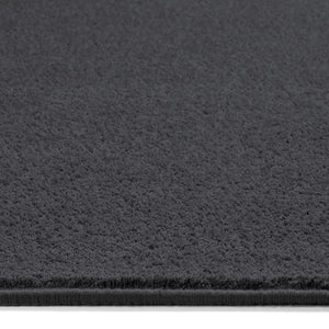 Sense Charcoal Washable Rug Runner- a 100% recycled polyester rug runner in a dark grey.