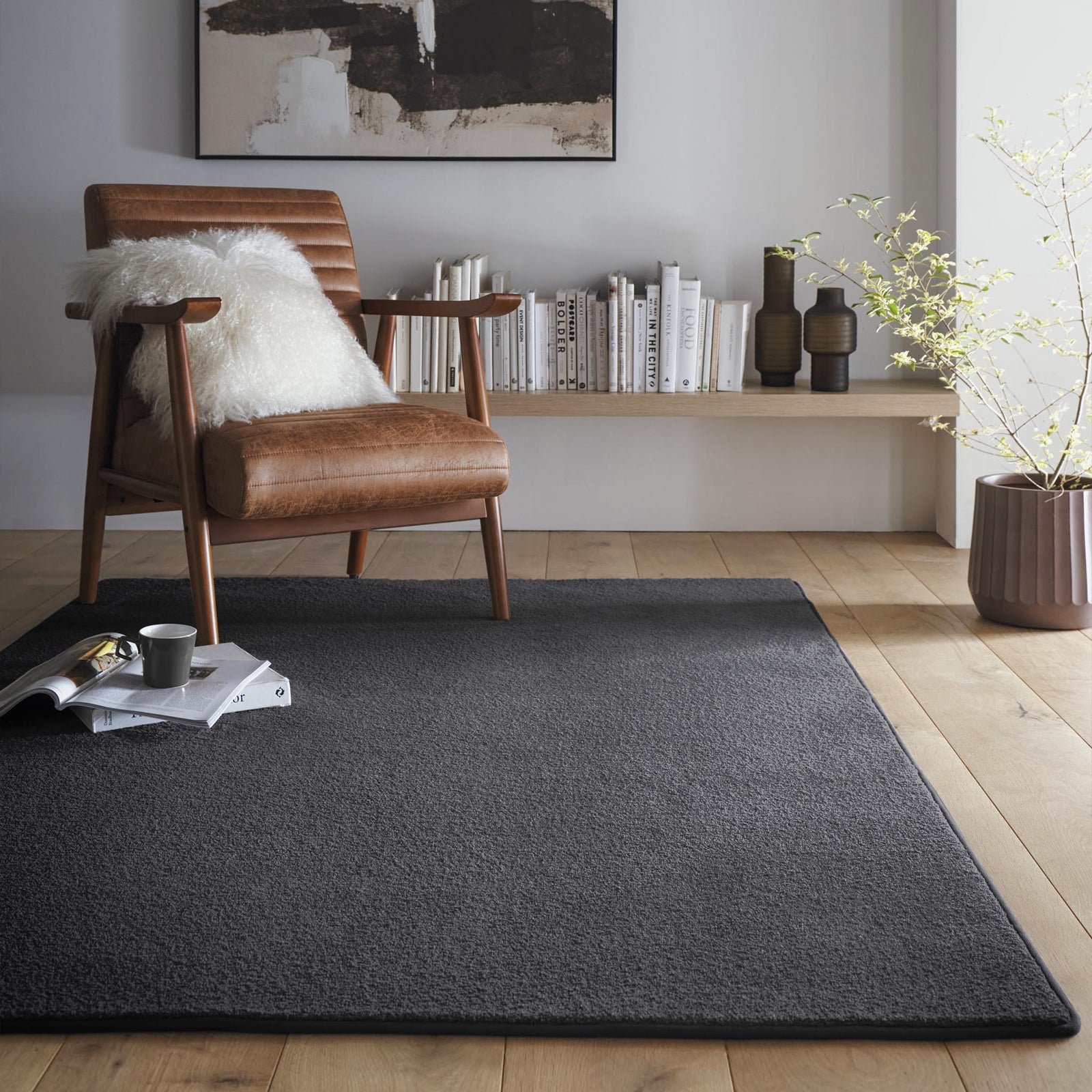 Sense Charcoal Washable Rug- a 100% recycled polyester rug in a dark grey.