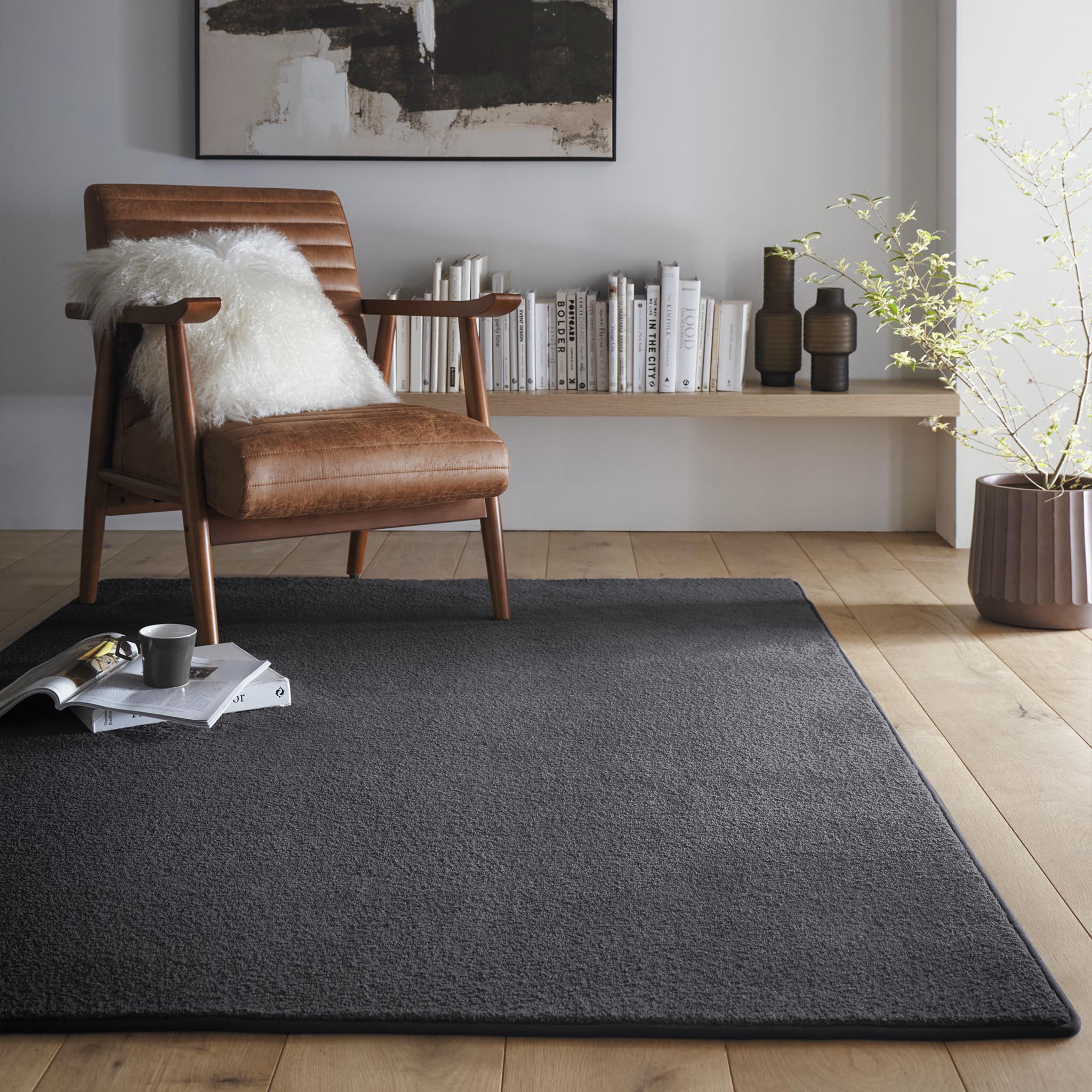 Sense Charcoal Washable Rug- a 100% recycled polyester rug in a dark grey.