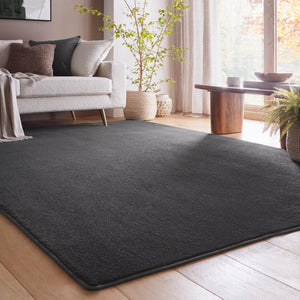 Sense Charcoal Washable Rug- a 100% recycled polyester rug in a dark grey.
