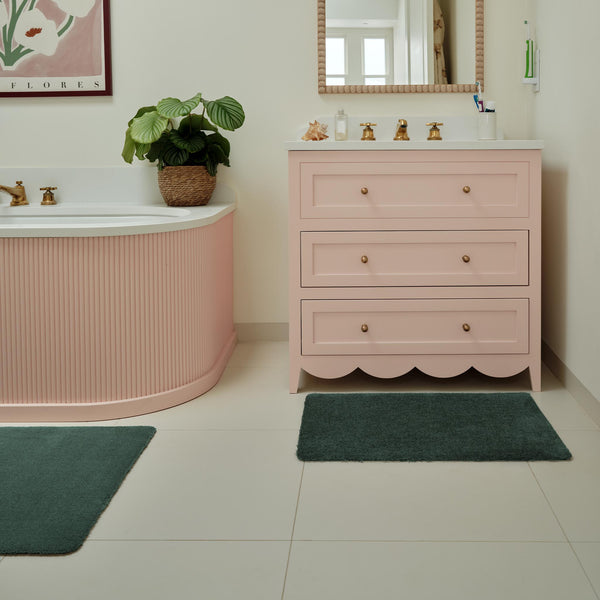 Sense Forest Green Bath Mat- a bath mat made from recycled materials in a solid dark green.