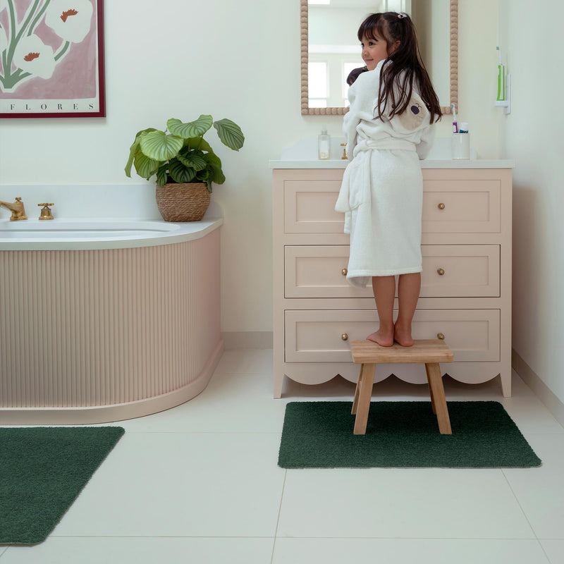 Sense Forest Green Bath Mat- a bath mat made from recycled materials in a solid dark green.