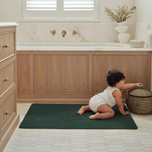 Sense Forest Green Bath Mat- a bath mat made from recycled materials in a solid dark green.