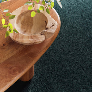 Sense Forest Green Rug made from 100% recycled content, fully machine washable.