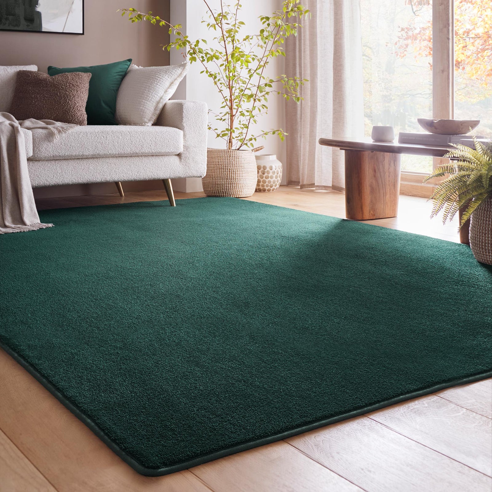 Sense Forest Green Rug made from 100% recycled content, fully machine washable.