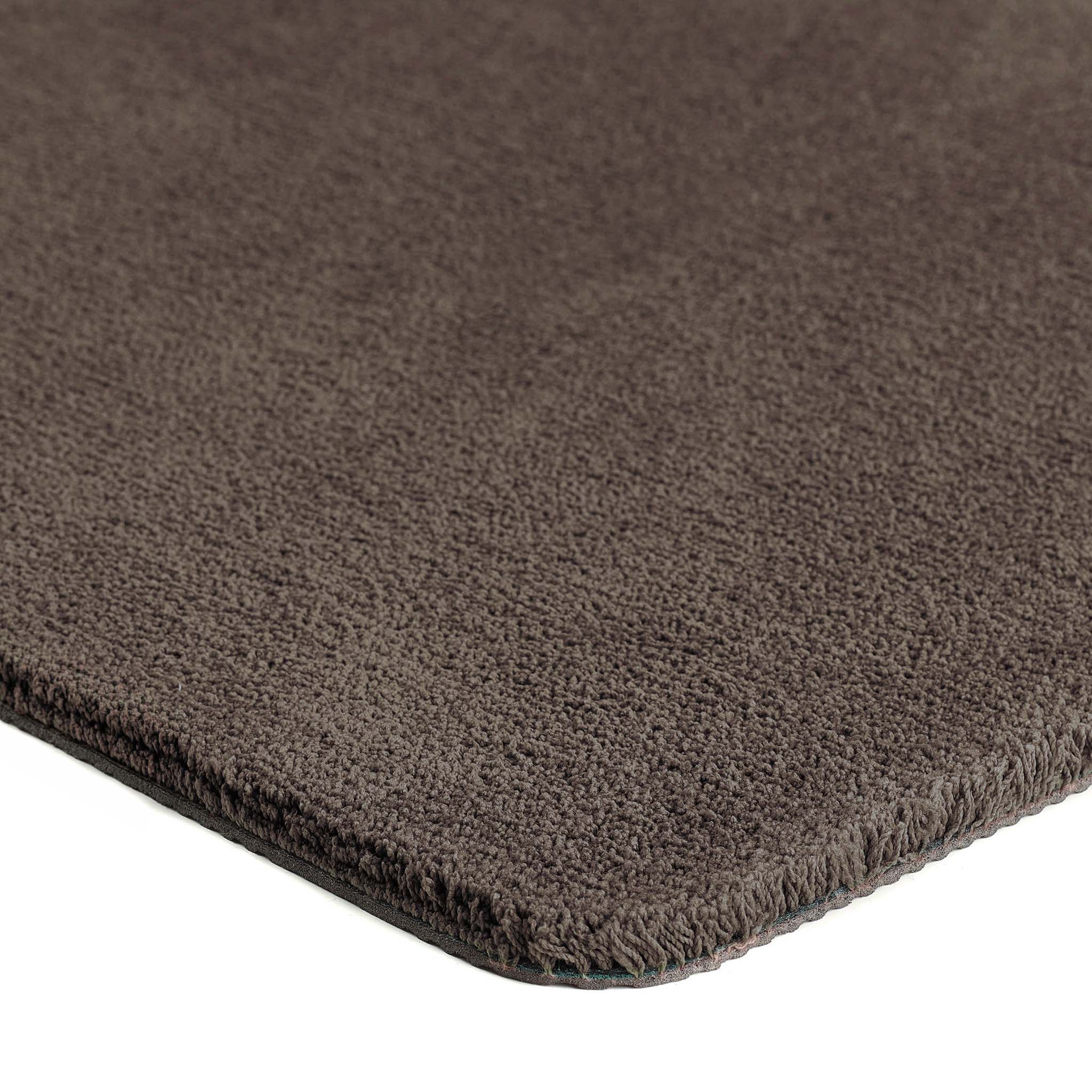Sense Stone Washable Runner in brown made from recycled materials, styled with pile height showing. 