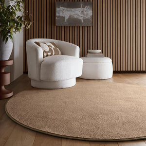 Sense Stone Washable Rug- a 100% recycled polyester rug in a solid brown.