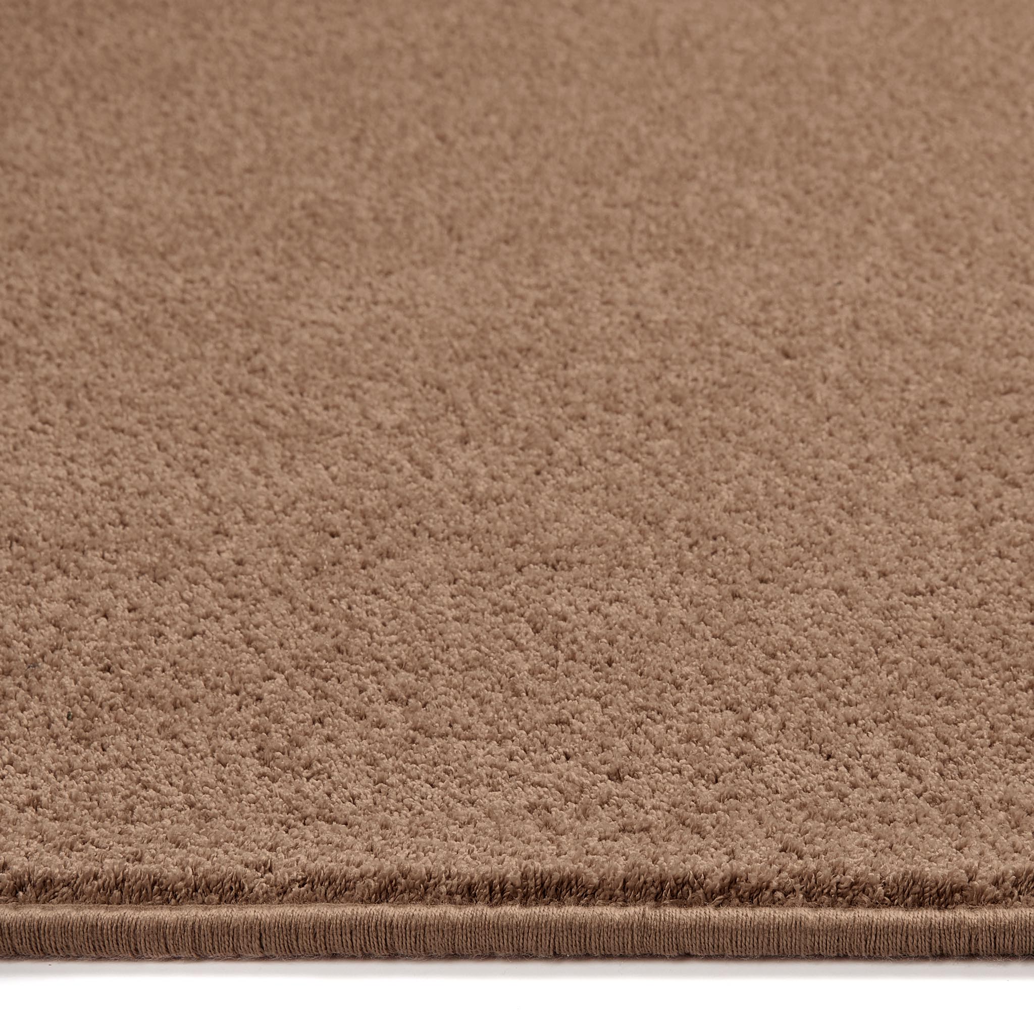 Sense Stone Rug- a rug in a solid beige made up from 100% plastic bottles.