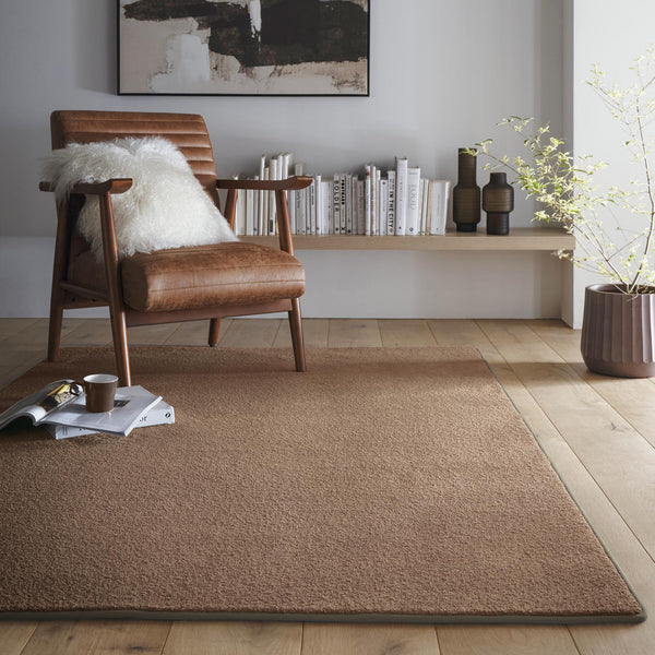 Sense Stone Rug- a rug in a solid beige made up from 100% plastic bottles.