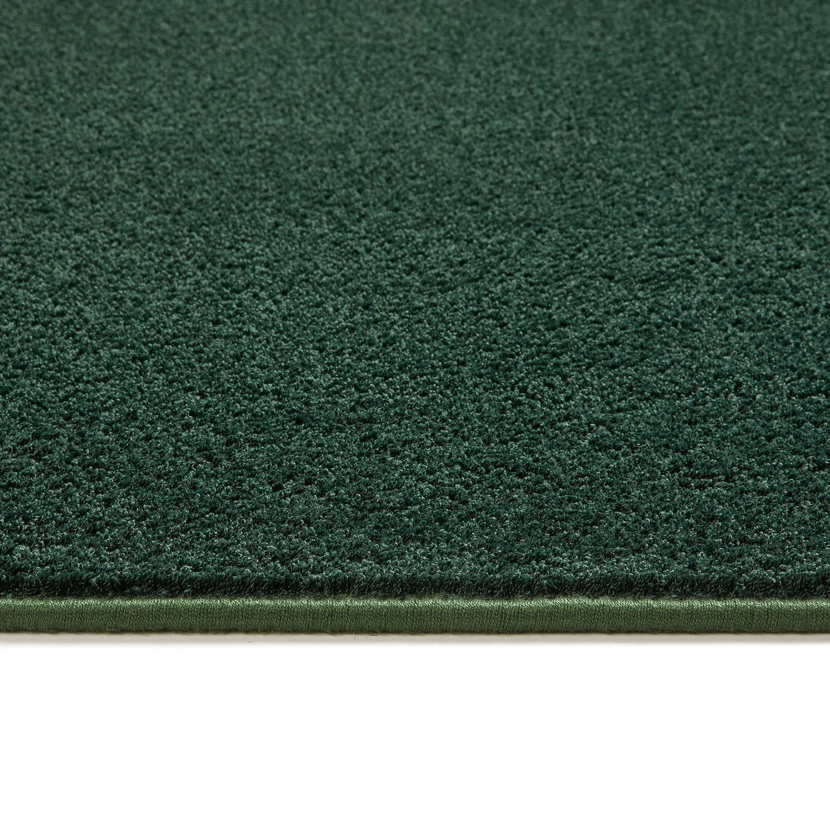 Sense Forest Green Rug made from 100% recycled content, fully machine washable.