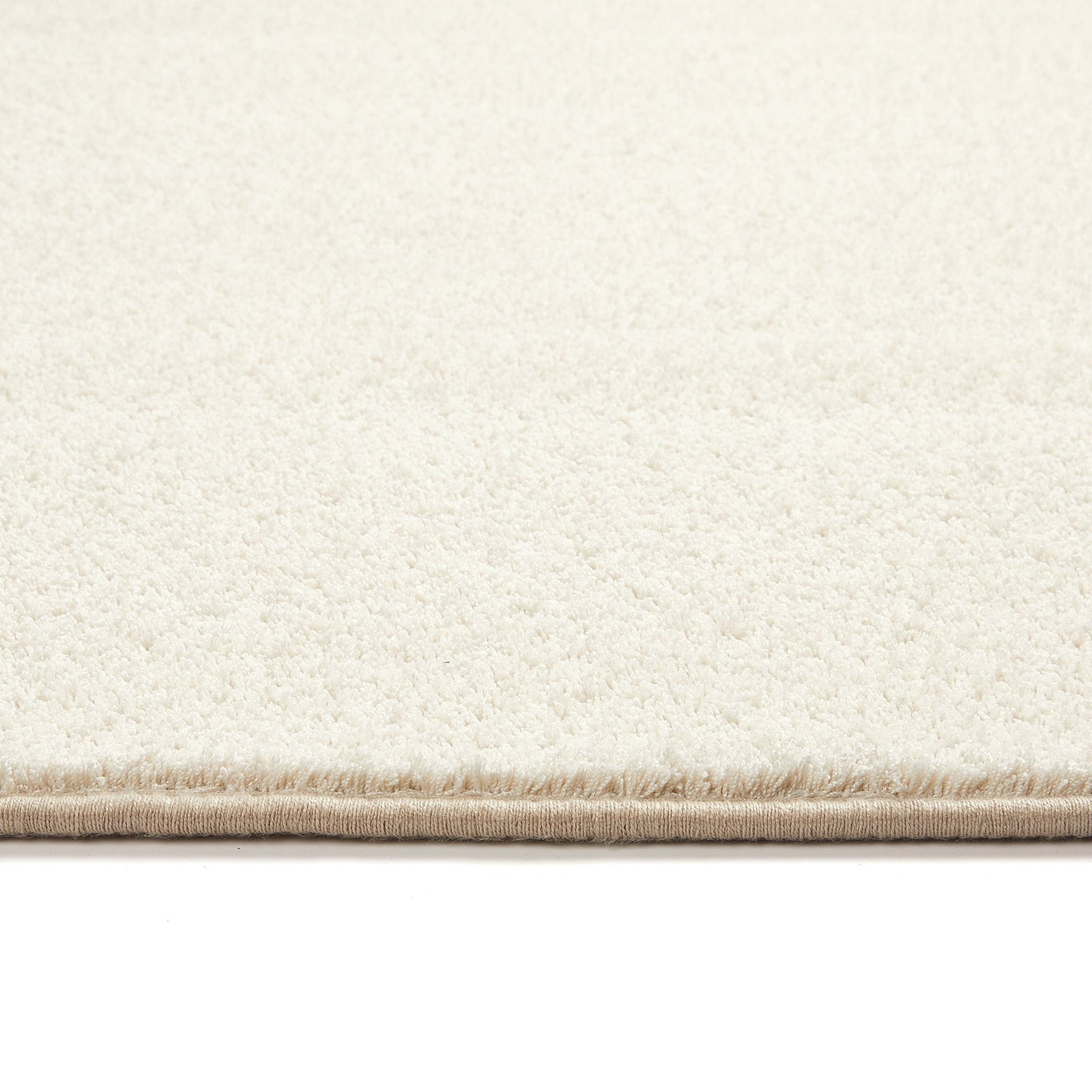 Pumice Stone Washable Runner- a 100% recycled PET plastic runner in a solid cream colour.