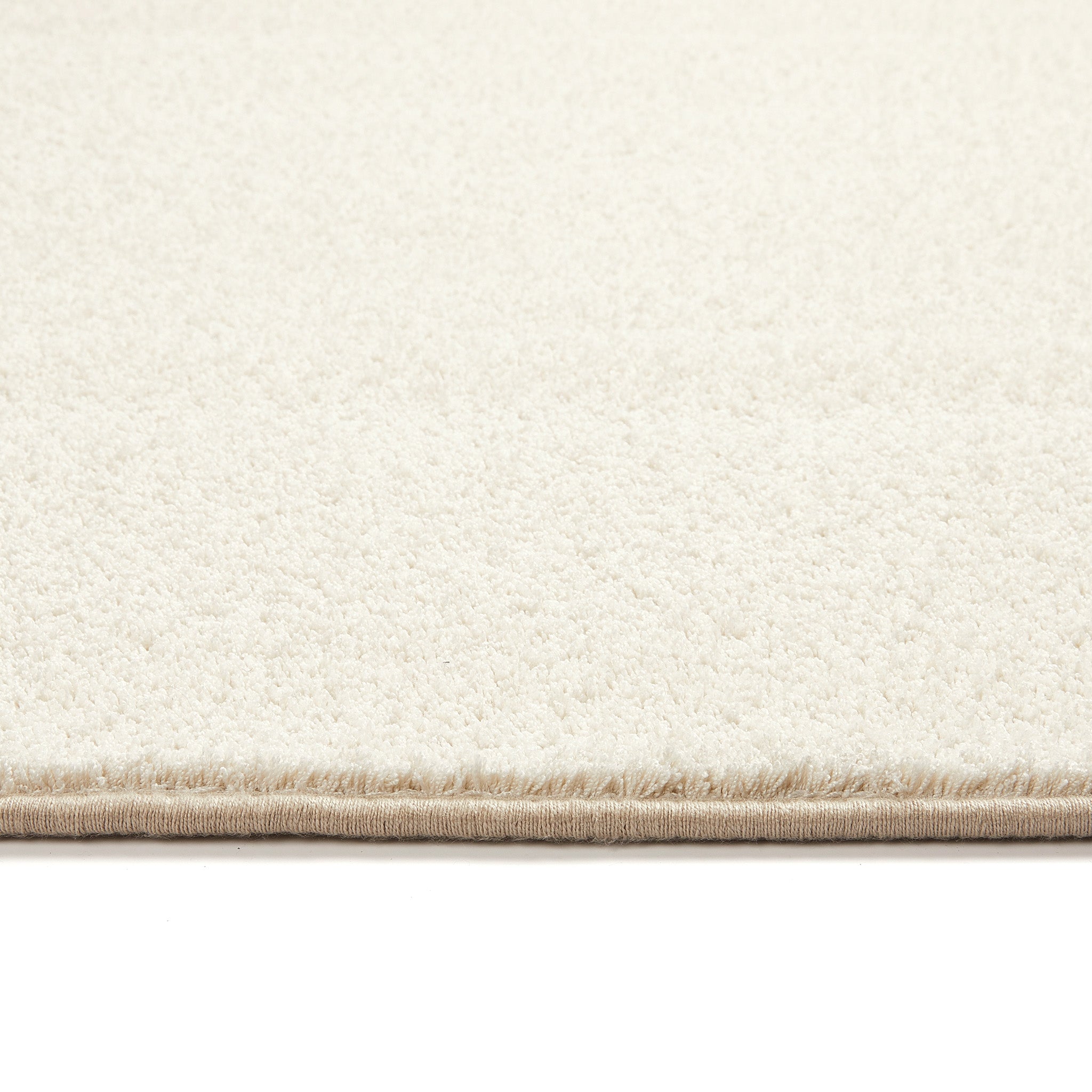 Pumice Stone Washable Runner- a 100% recycled PET plastic runner in a solid cream colour.