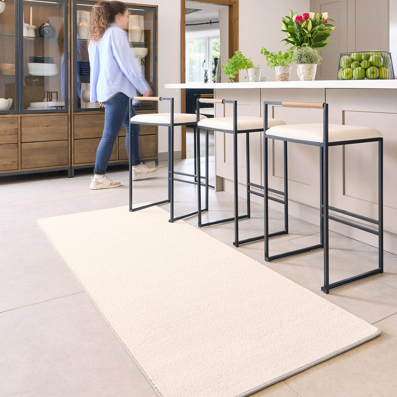 Pumice Stone Washable Runner- a 100% recycled PET plastic runner in a solid cream colour.