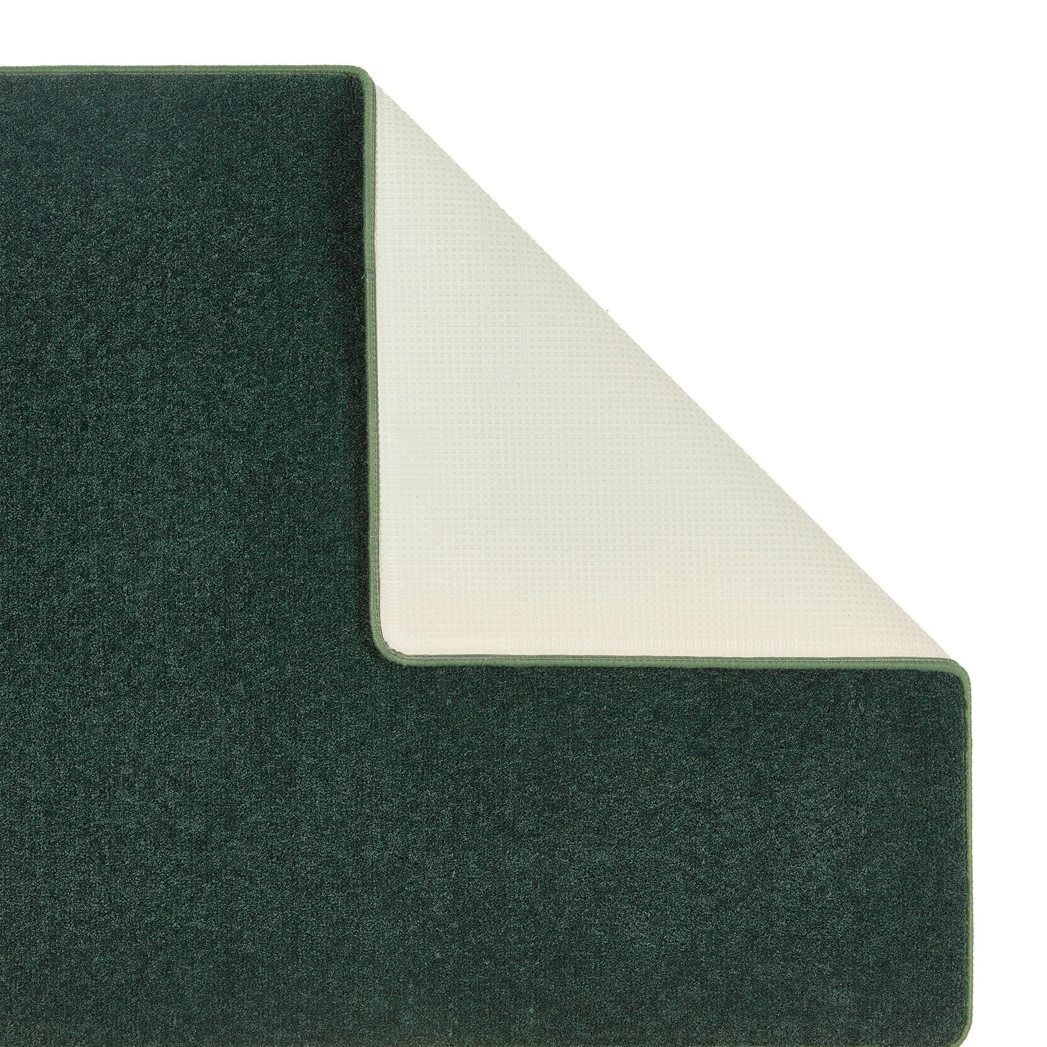 Sense Forest Green Rug made from 100% recycled content, fully machine washable.