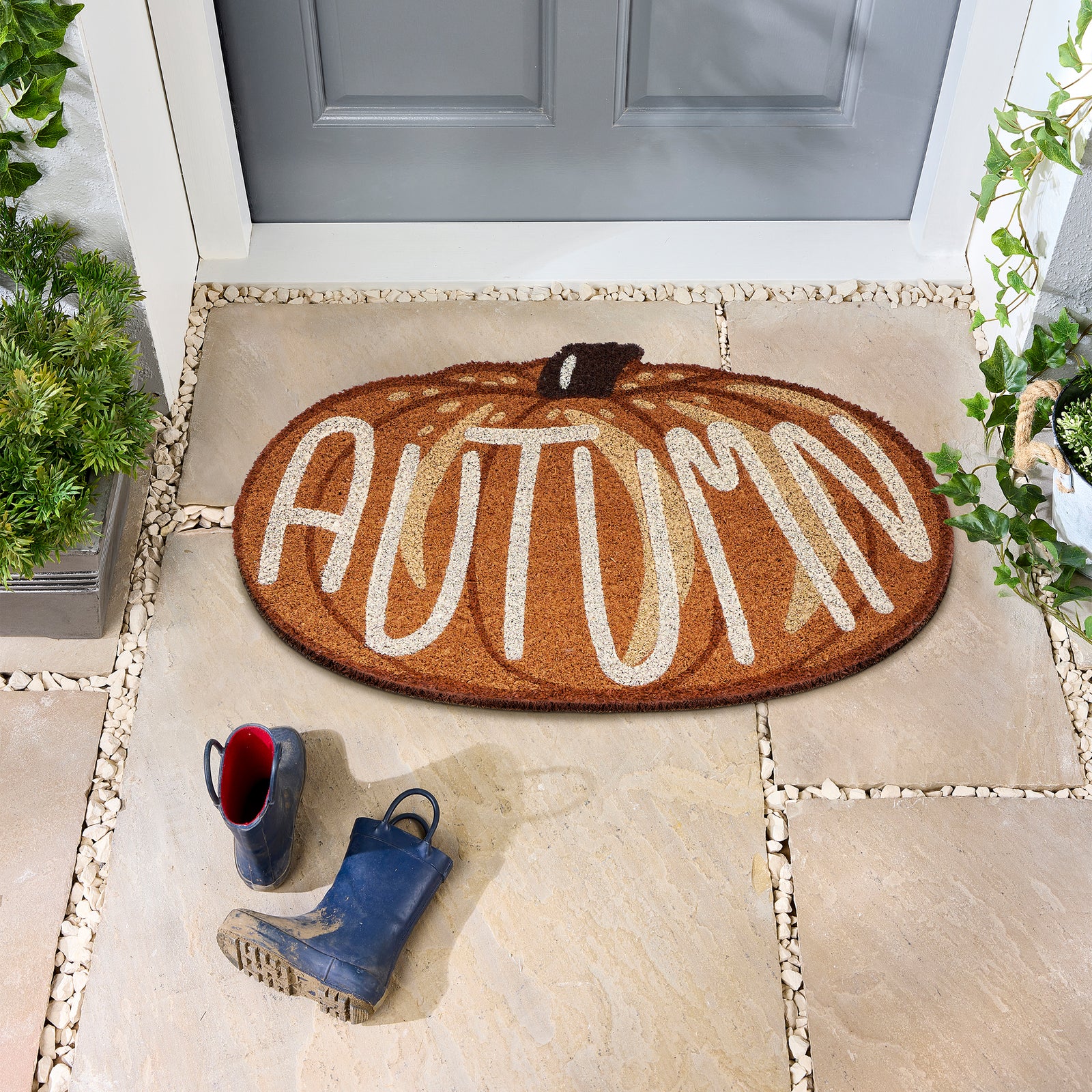 Shaped Autumn Pumpkin Coir Doormat made from natural coconut husk fibres, featuring graphic font.
