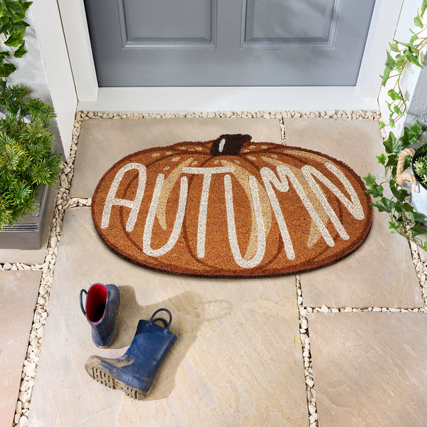 Discover the Shaped Autumn Pumpkin Coir Doormat- a coir dormant shaped as a pumpkin with graphic font. 