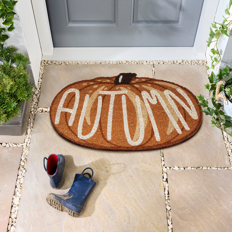 Shaped Autumn Pumpkin Coir Doormat made from natural coconut husk fibres, featuring graphic font.