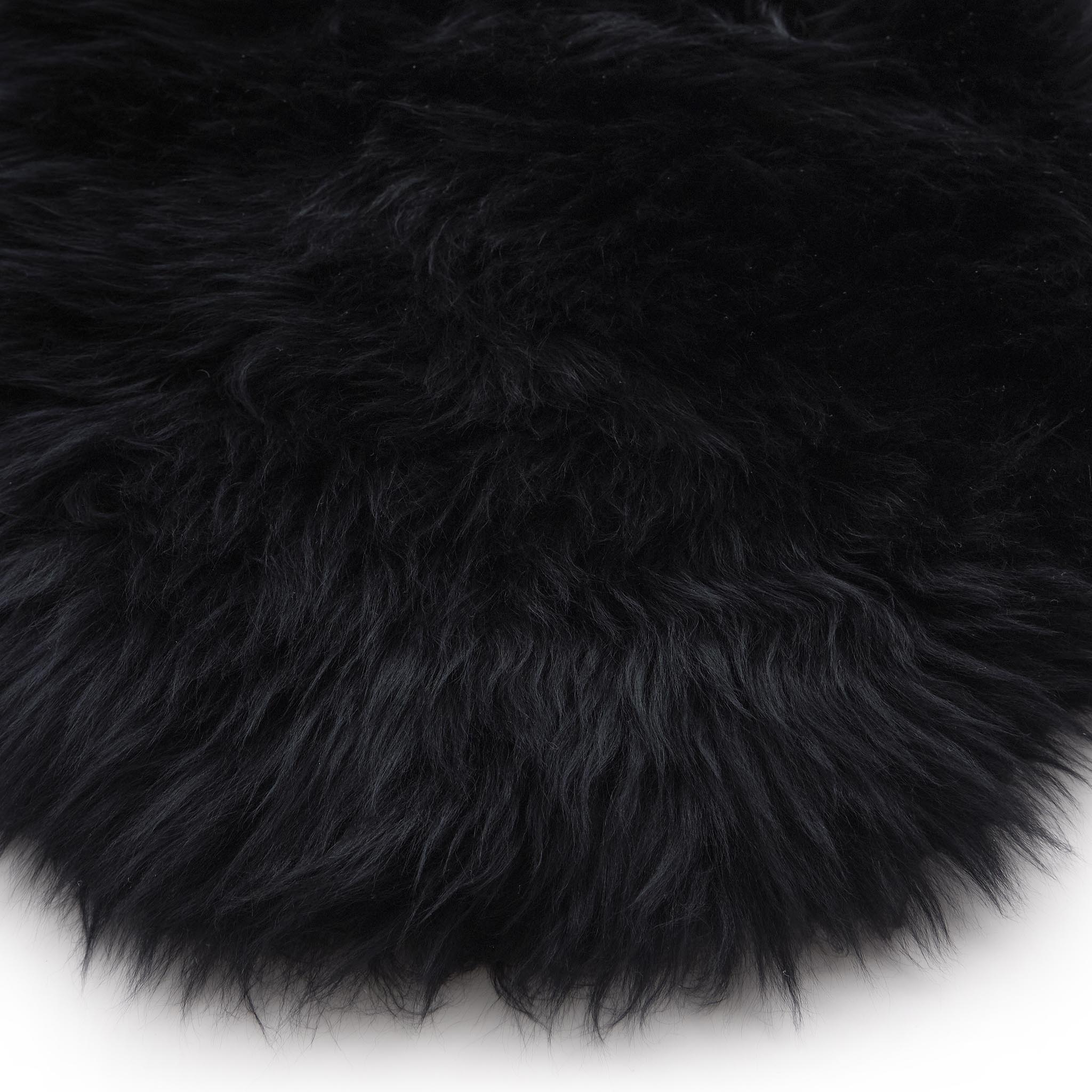 Close-up of Double Sheepskin Black Rug made up of long-haired wool.