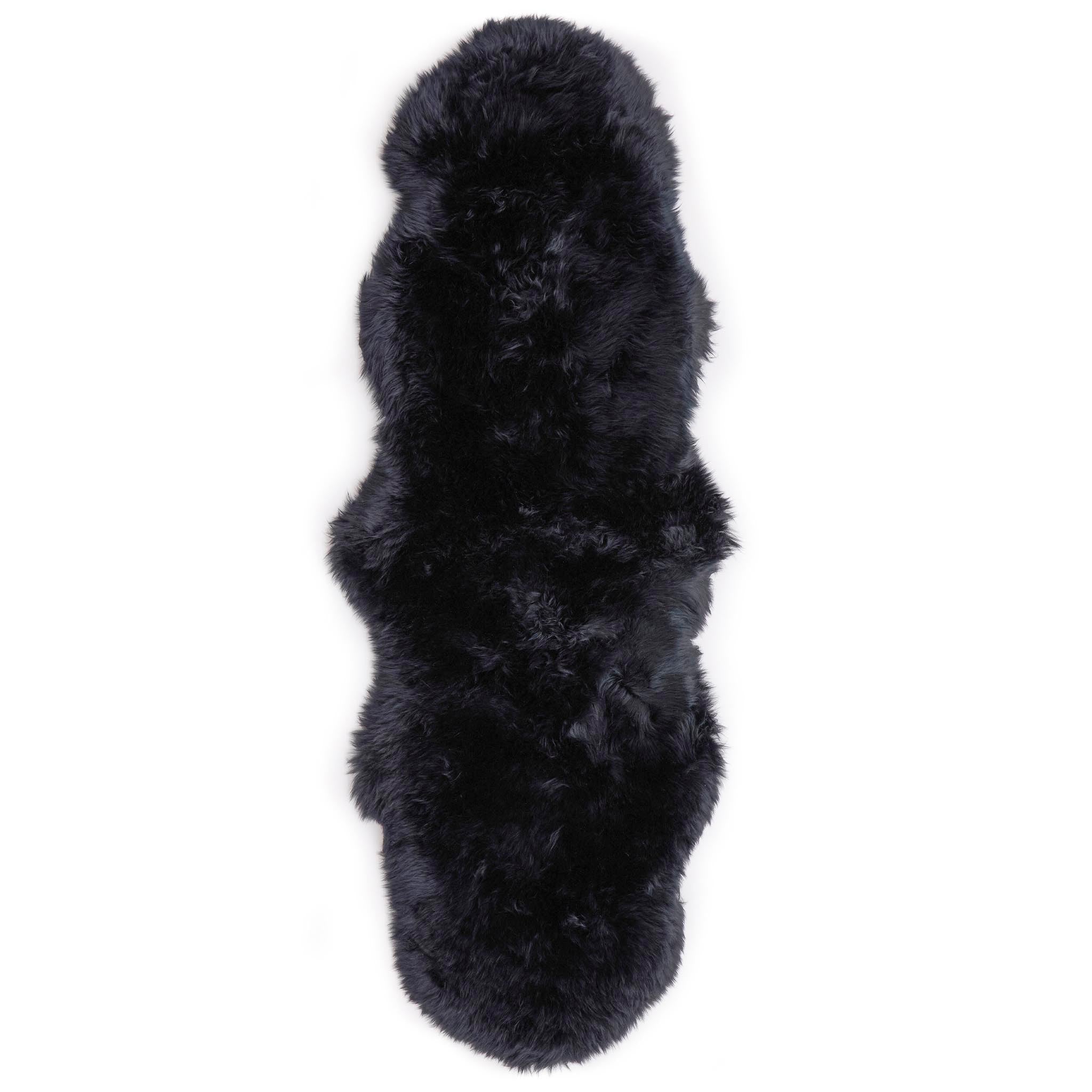  Double Sheepskin Black Rug made up of long-haired wool.