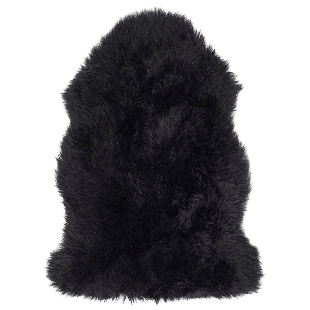 Single Sheepskin rug in black overhead on white background