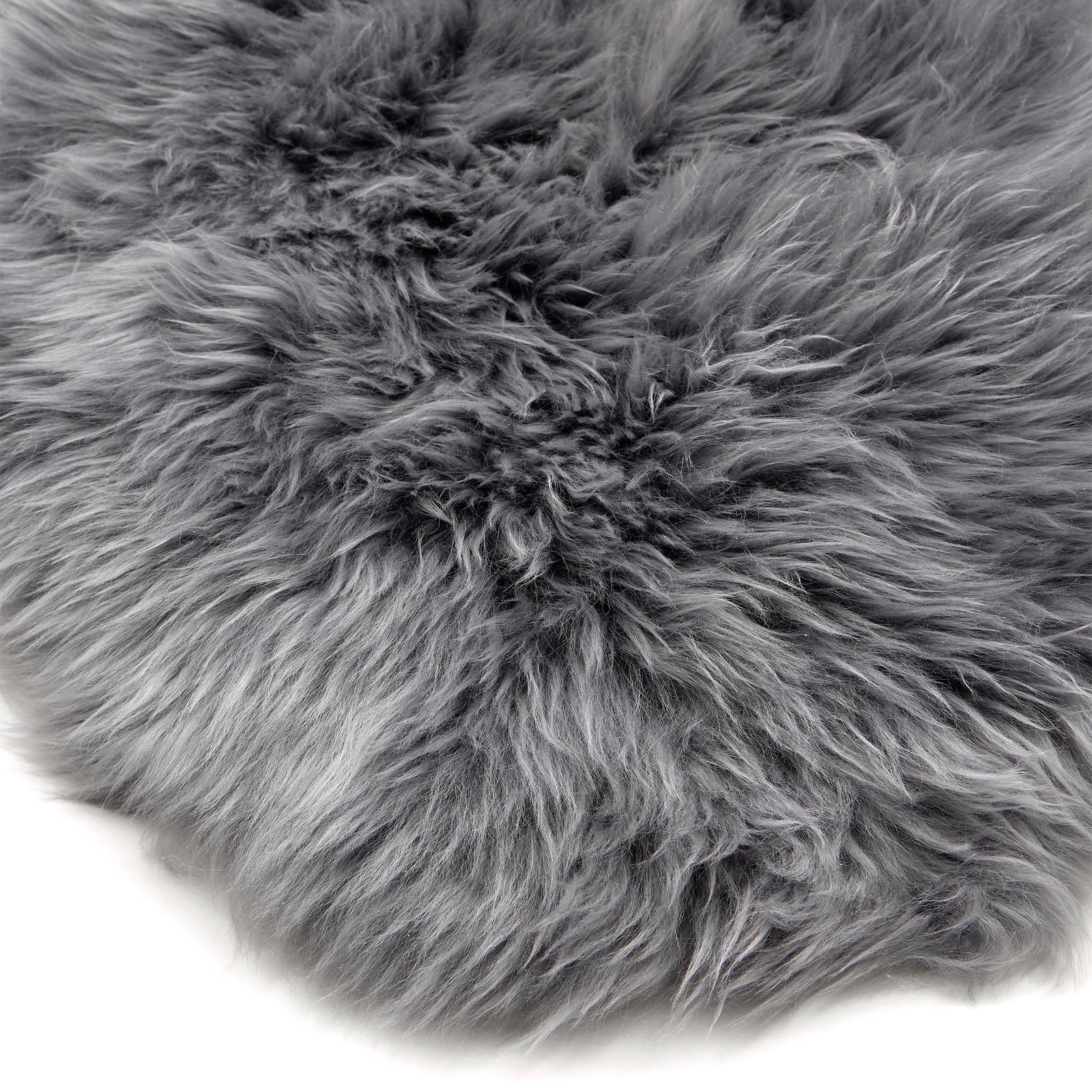 Close-up of Sheepskin Rug Grey showing the shaggy pile.