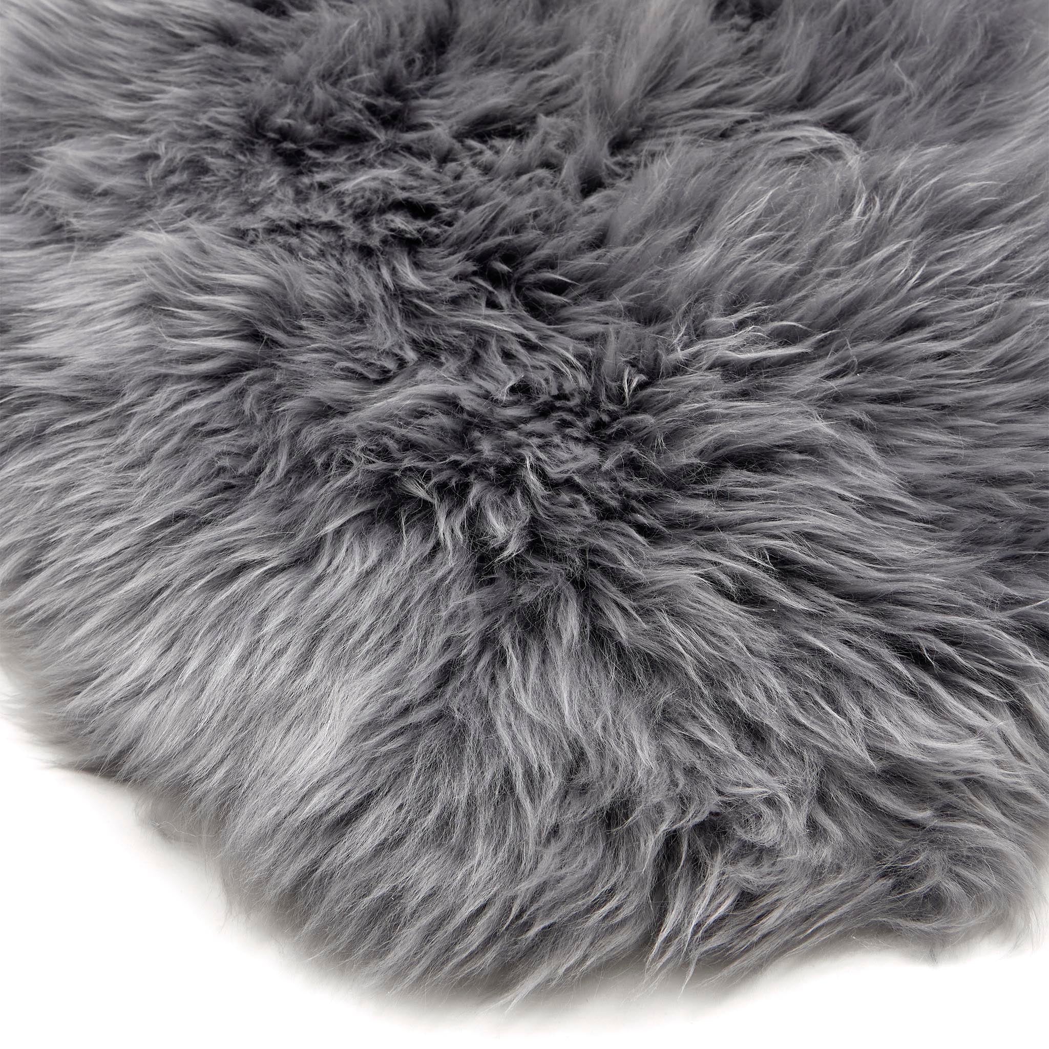 Close-up of Sheepskin Rug Grey showing the shaggy pile.