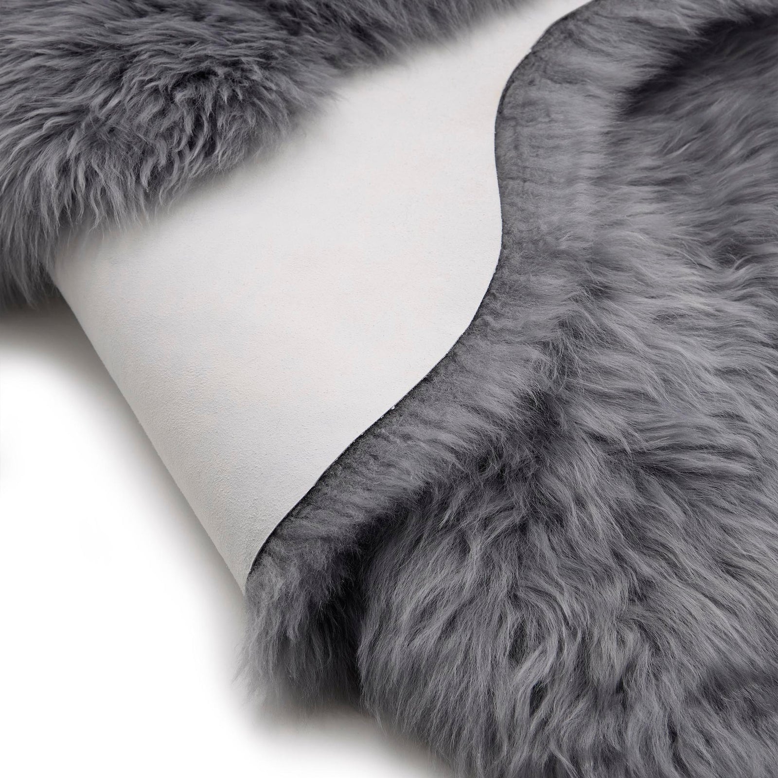Close-up of double Sheepskin Grey Rug made from long-haired wool. 