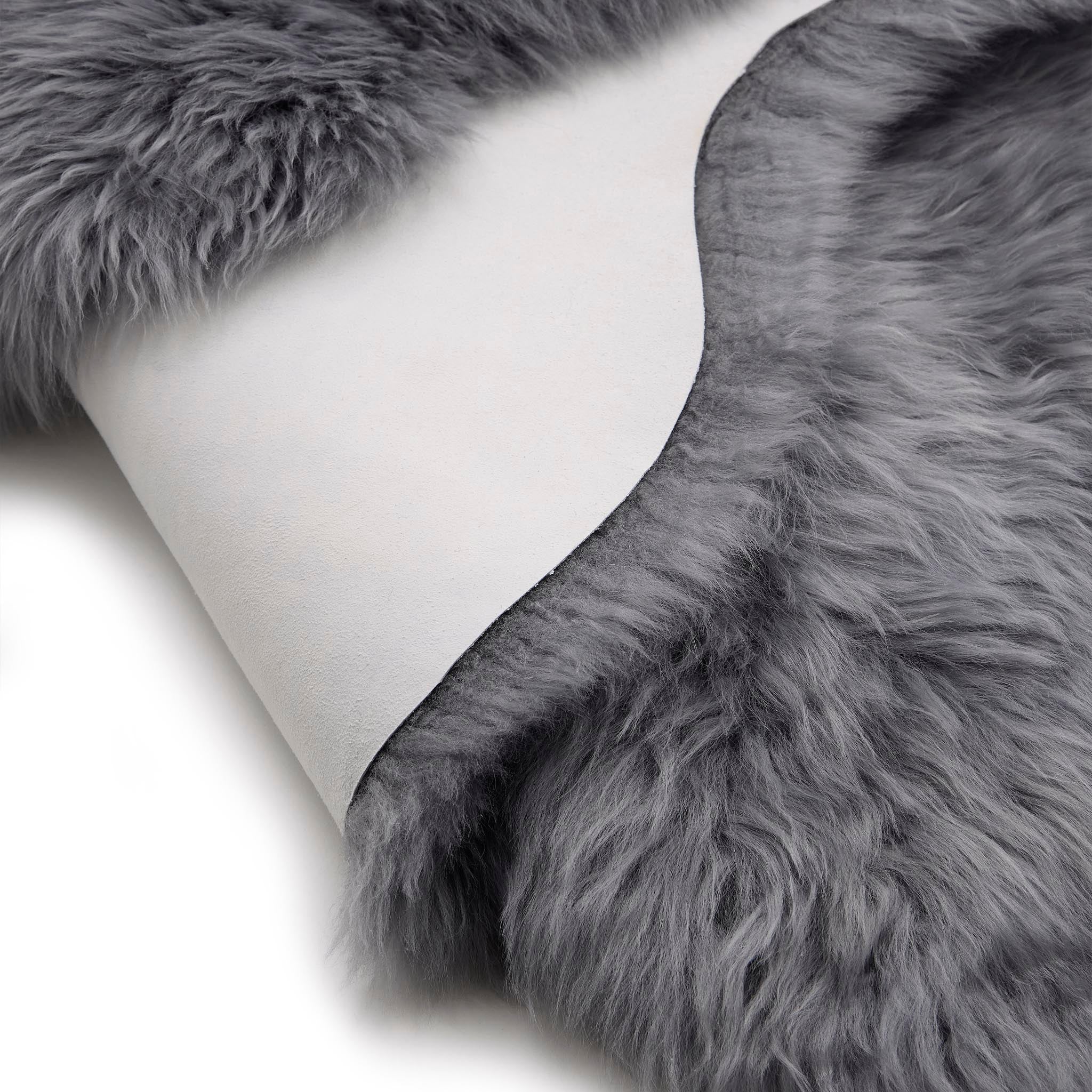 Close-up of double Sheepskin Grey Rug made from long-haired wool. 