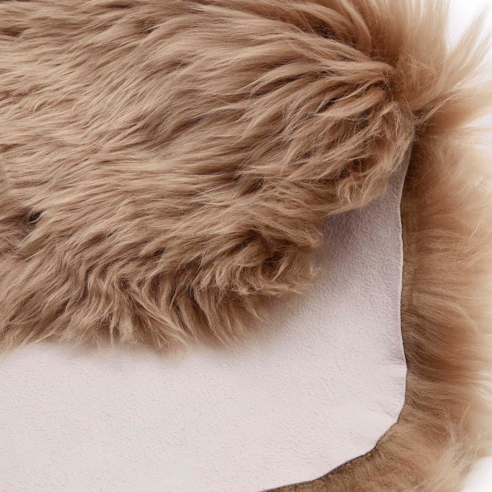 Single Sheepskin Mink Brown Wool Rug showing backing.