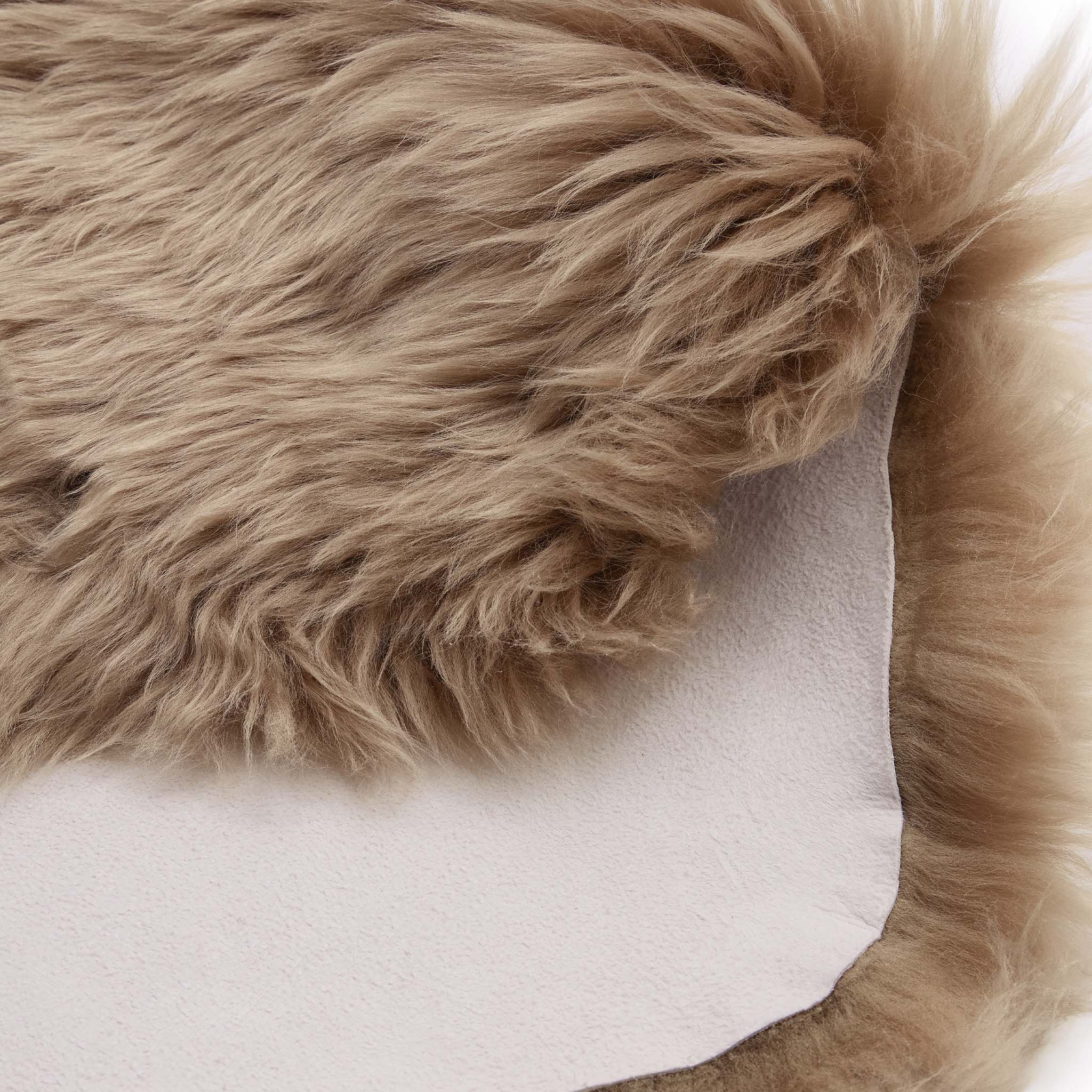 Single Sheepskin Mink Brown Wool Rug showing backing.