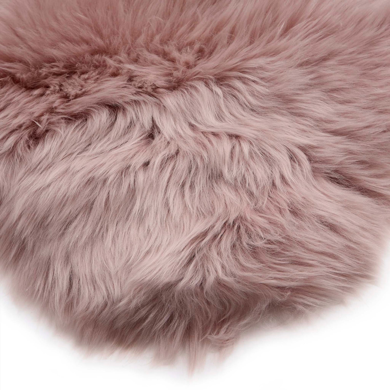 Close-up of Single Sheepskin Rose Pink Rug showing pile height.