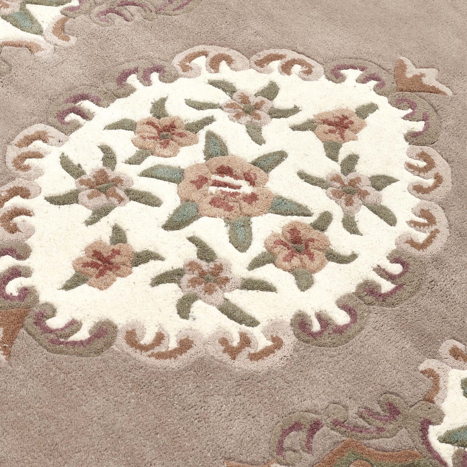Shensi Beige Rug - a 100%  wool rug featuring a traditional floral pattern.