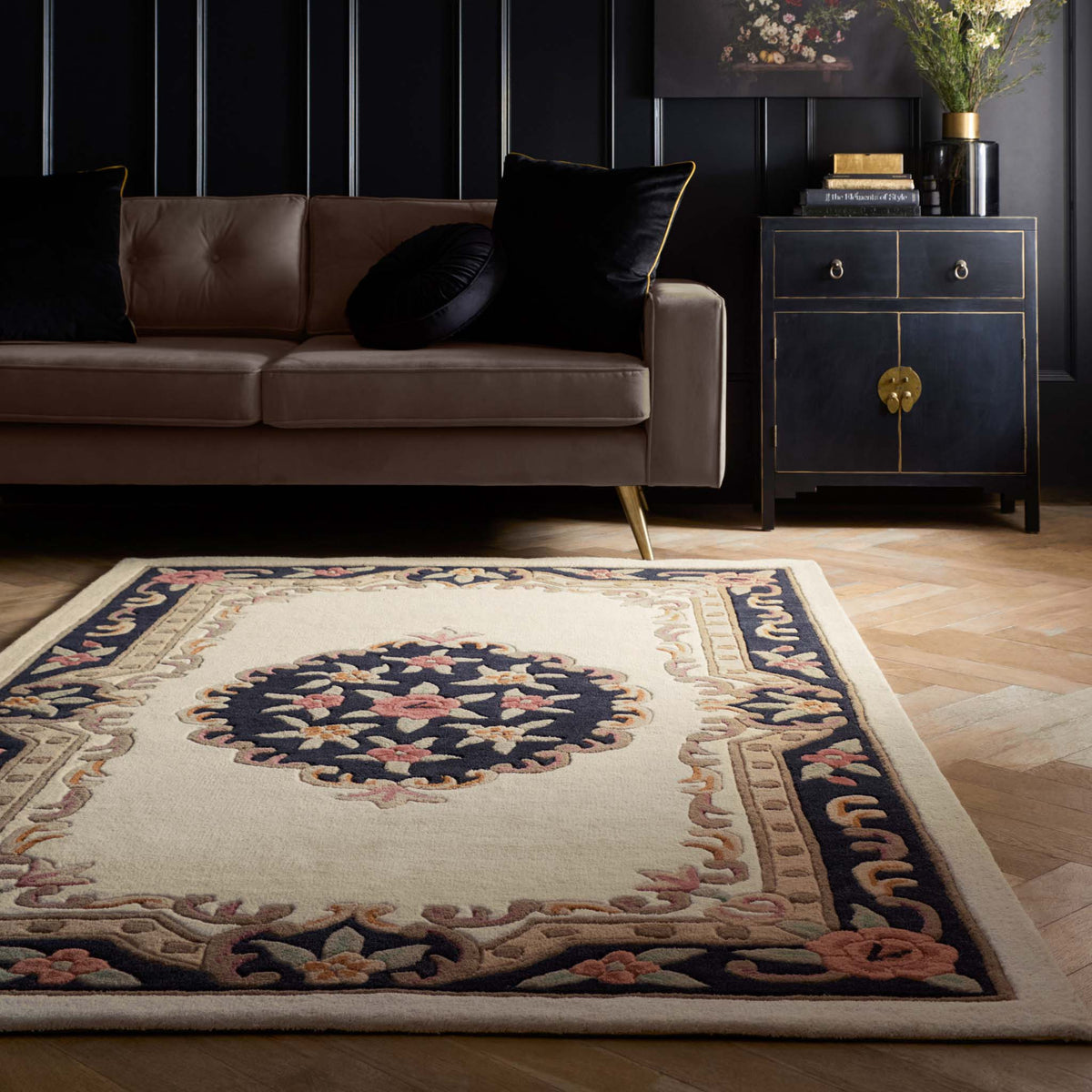 Shensi Black Wool Rug with a tradtional floral pattern, styled in a living room.