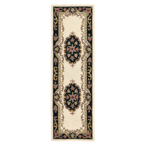 Shensi Aubusson Rug Runner in Black with a traditional floral pattern.