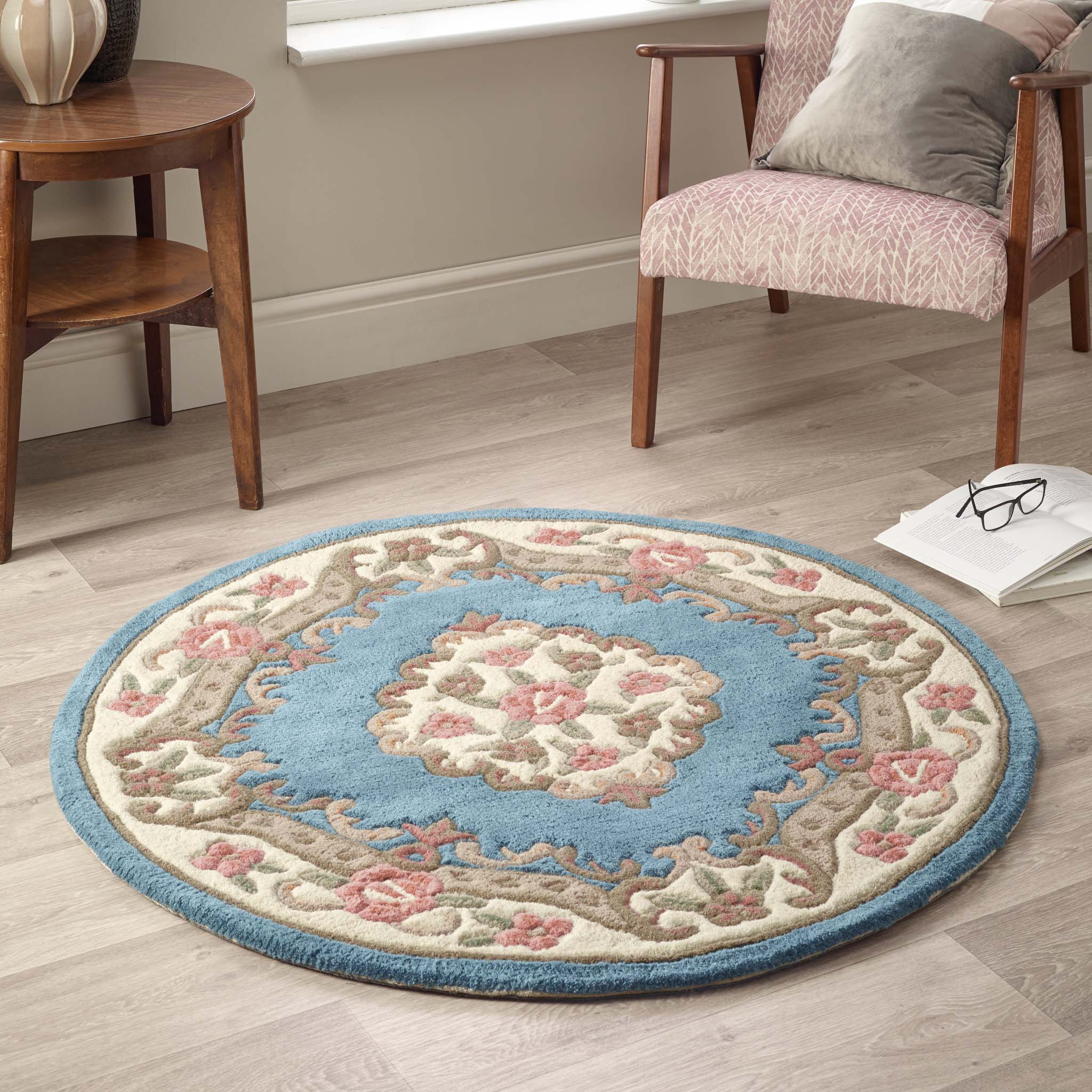 Shensi Blue Rug - a 100% wool rug featuring a traditional floral pattern.