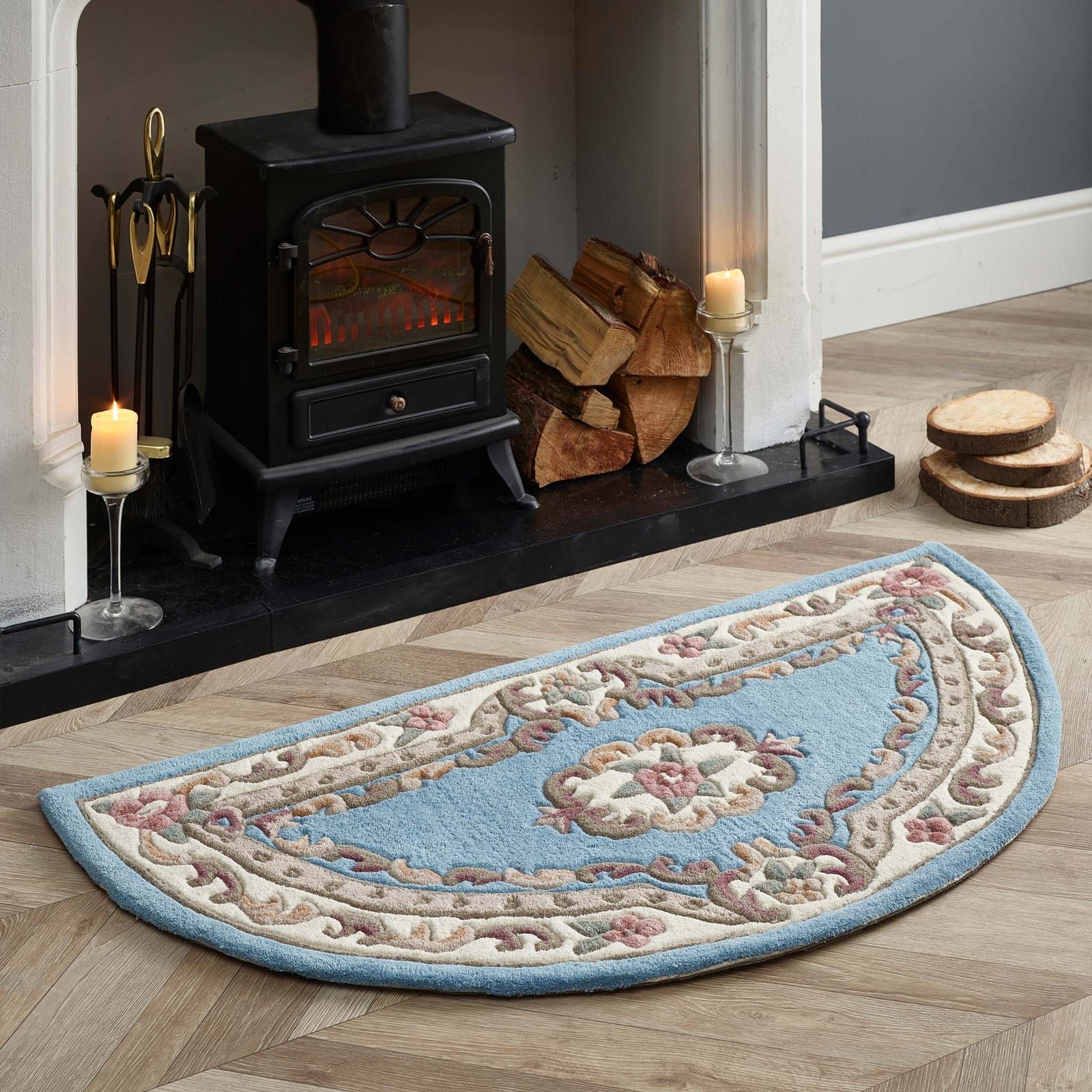 Shensi Blue Rug - a 100% wool rug featuring a traditional floral pattern.