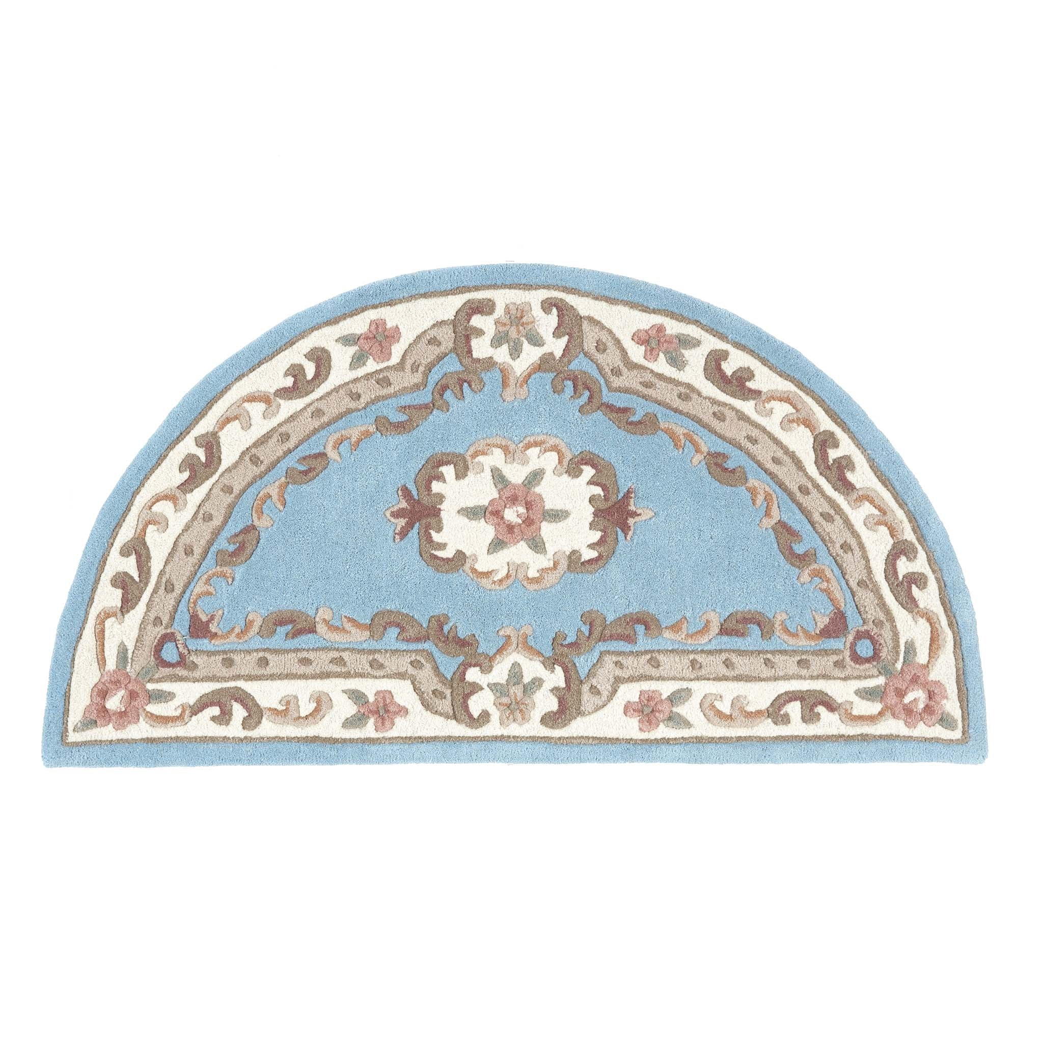 Shensi Blue Rug - a 100% wool rug featuring a traditional floral pattern.
