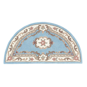 Shensi Blue Rug - a 100% wool rug featuring a traditional floral pattern.