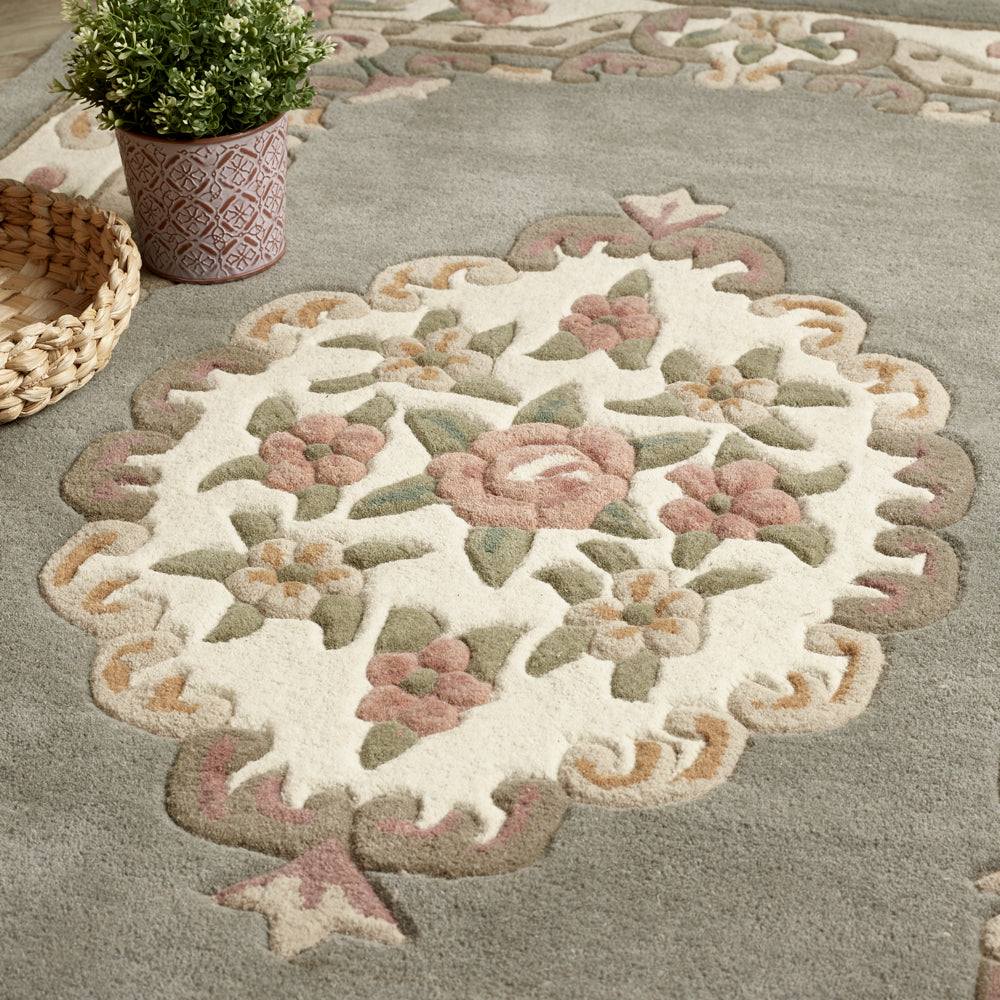 Shensi Aubusson Grey Rug made from 100% wool, featuring an ornate design. 