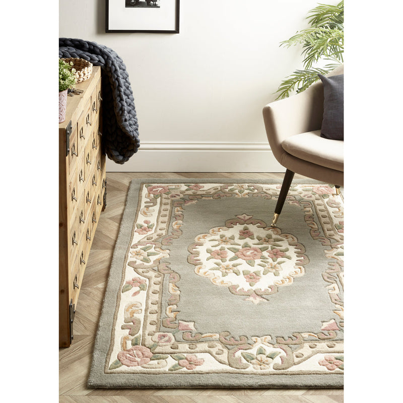 Shensi Aubusson Grey Rug made from 100% wool, featuring an ornate design. 