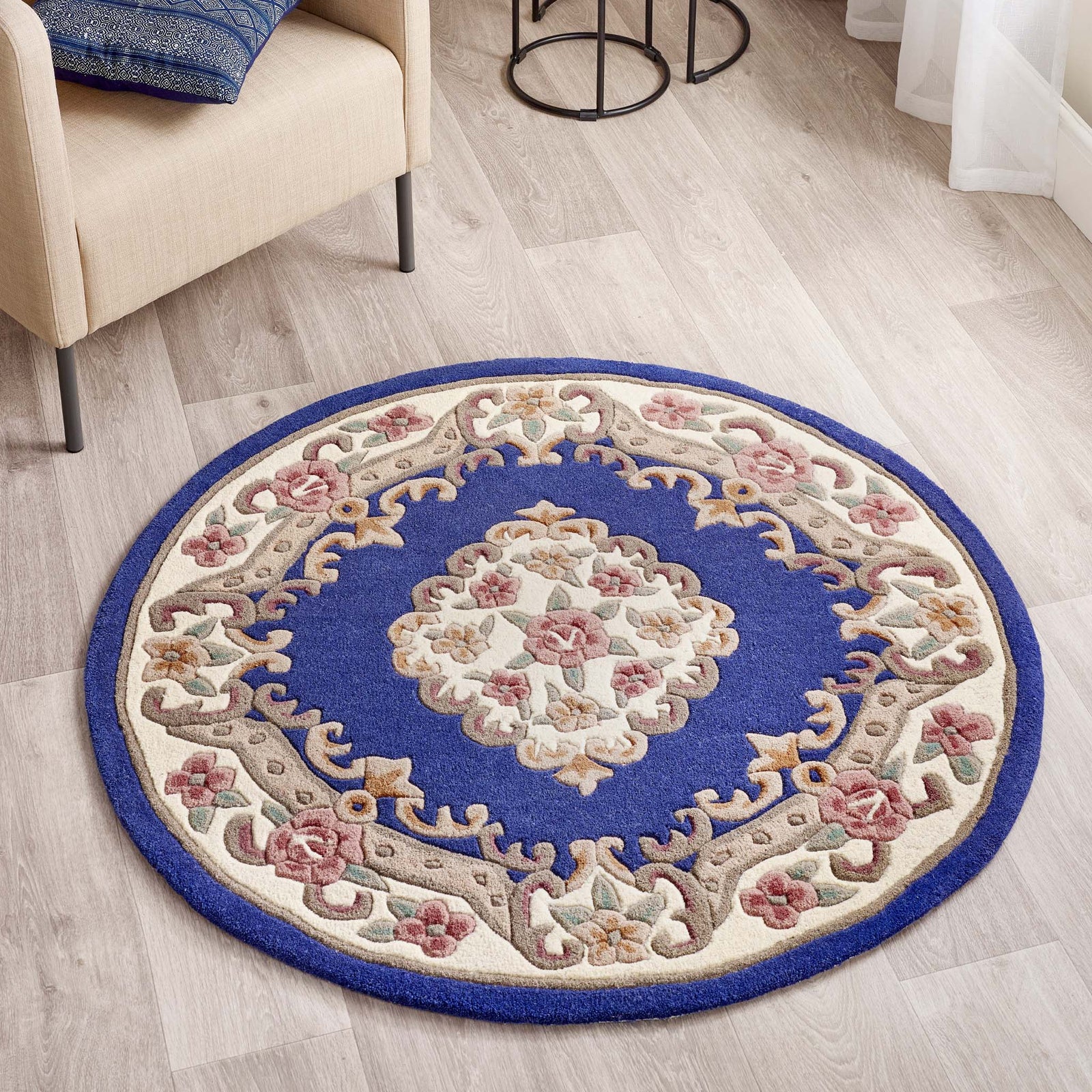 Shensi Navy Blue Wool Rug with a traditional floral pattern, styled on wooden flooring.
