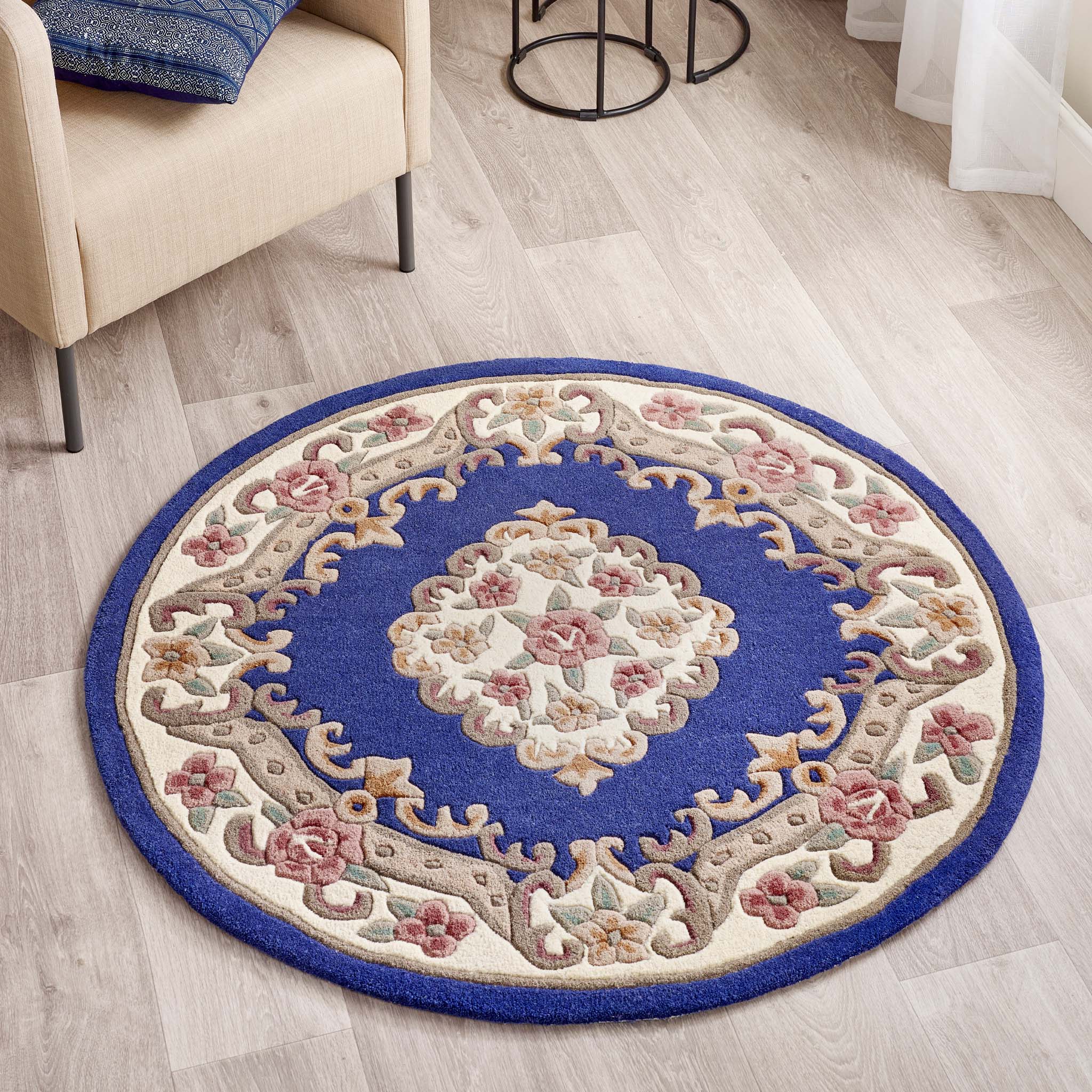 Shensi Navy Blue Wool Rug with a traditional floral pattern, styled on wooden flooring.