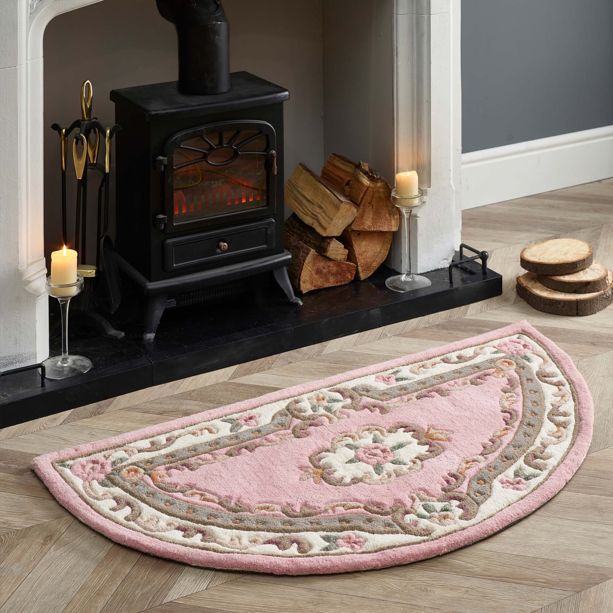 Shensi Pink Wool Rug with a traditional floral pattern, styled in a living room.